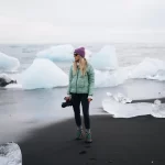 Standing between icebergs at Diamond Beach, Iceland