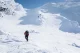 Hiker heading to Saua Caprei in winter snow