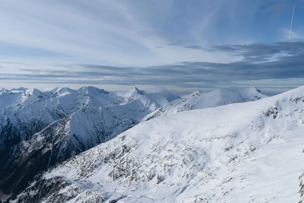 Panoramic view of snow-covered mountain ranges and ridges
