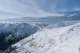 Panoramic view of snow-covered mountain ranges and ridges